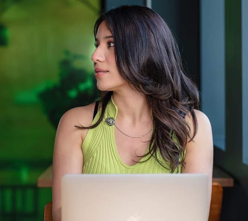 Gaea Kassatly, attorney, working at her laptop
